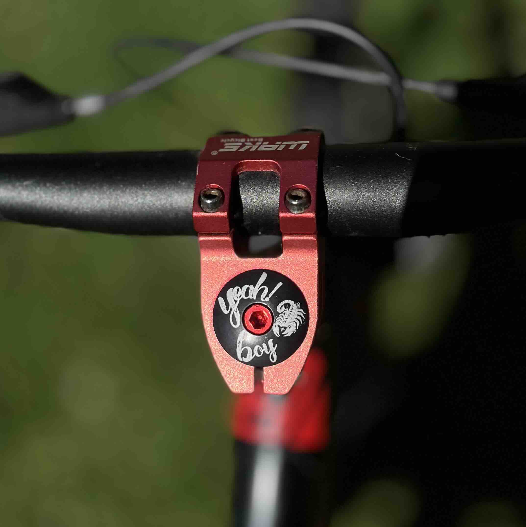 Yeah Boy Black Stem cap on bike